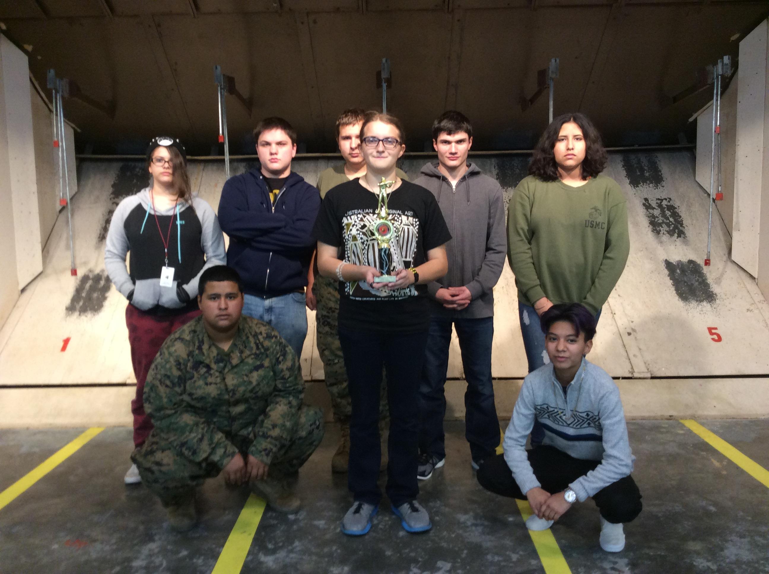Air-Rifle Team holding a their trophy