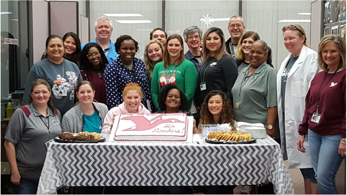 photo of teachers and cookies and cake