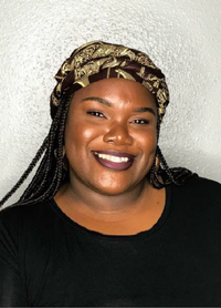 A picture of Flavie Vodounou, the Community Youth Specialist (CYS)