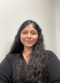 A picture of Flavie Vodounou, the Community Youth Specialist (CYS)